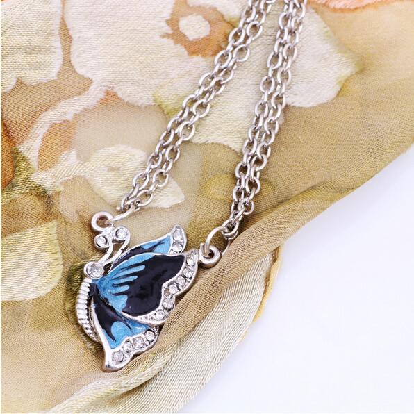 Charming Blue Butterfly Necklace - Floral Fawna