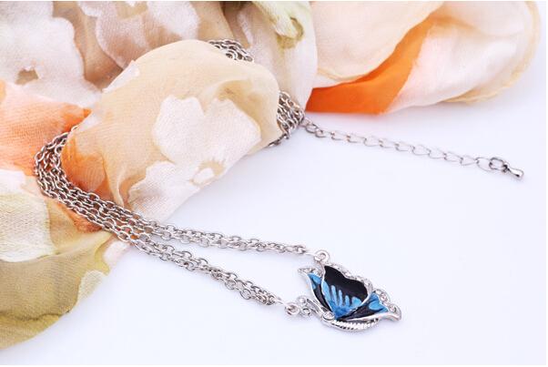 Charming Blue Butterfly Necklace - Floral Fawna