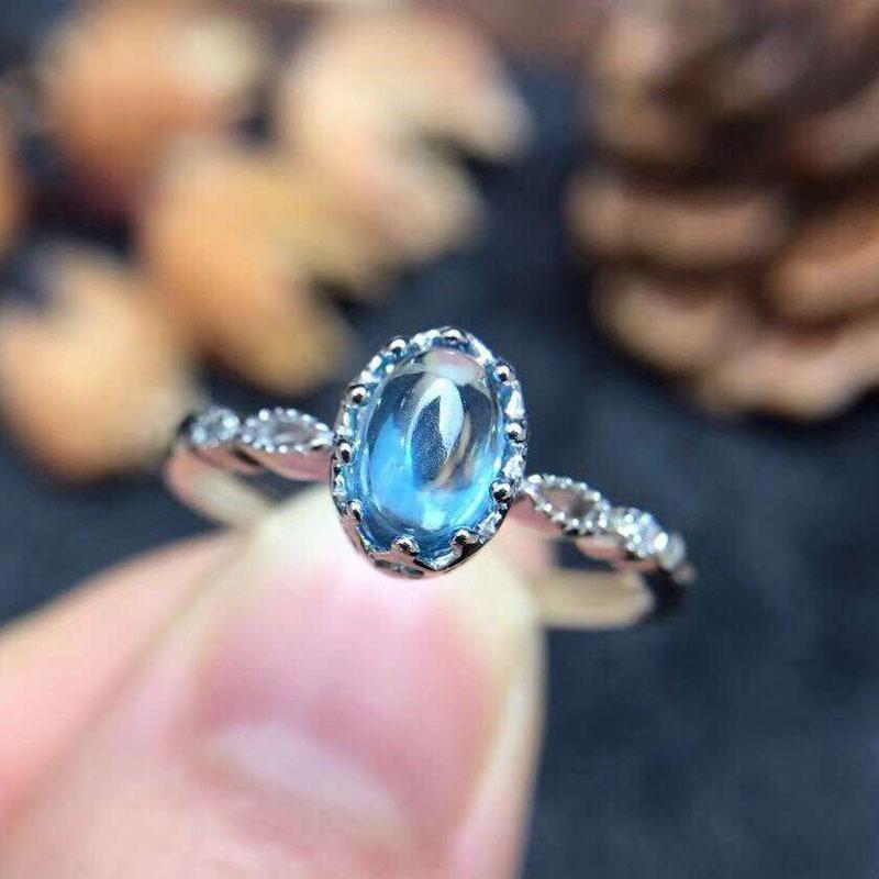 Elegant Blue Topaz Silver Ring - Floral Fawna